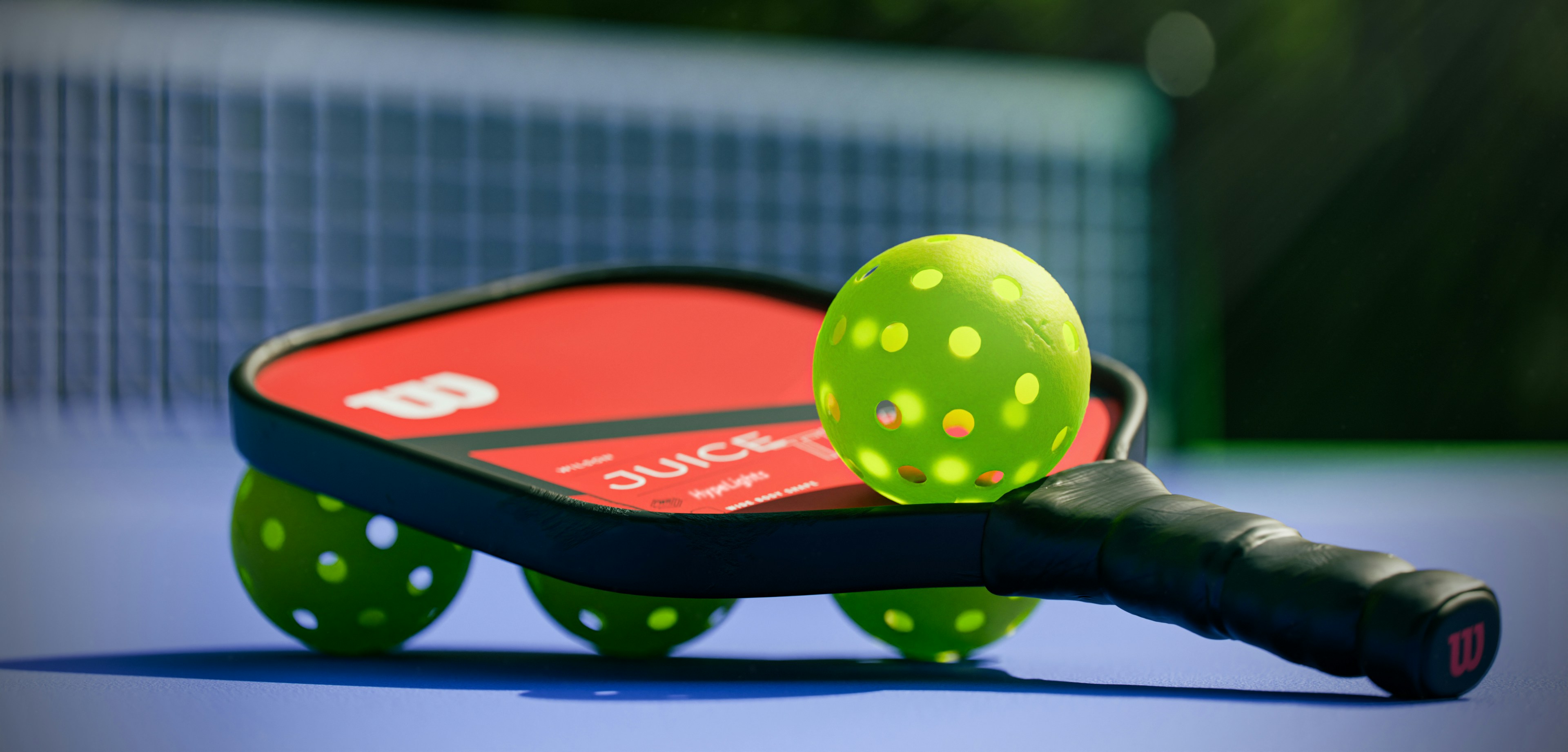 People playing pickleball